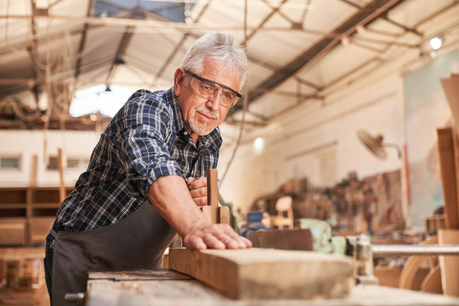 Craftsmen as Carpenter Master Planing Wood